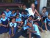 Holly Patton with her young friends in Belize